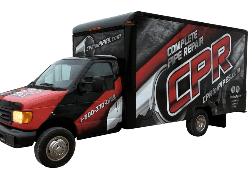 A red and black truck with the words " complete pipe repair " on it.